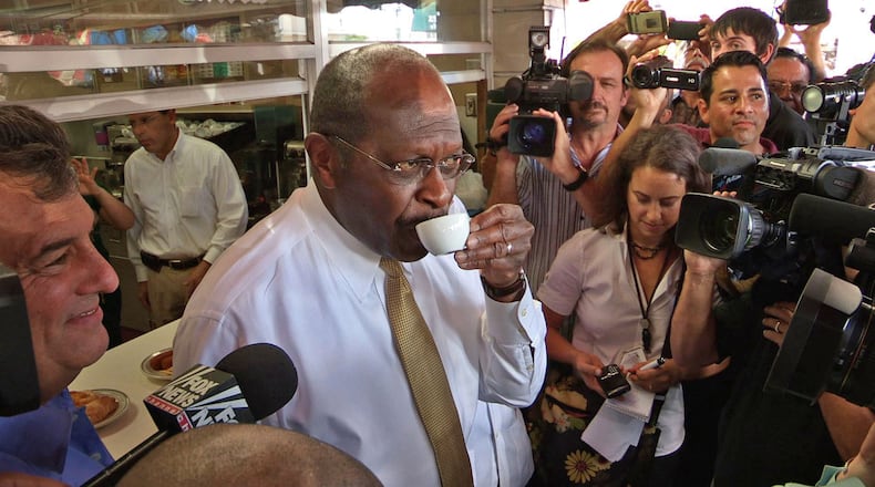 Herman Cain at a Florida stop near the end of campaign in 2011. AP file