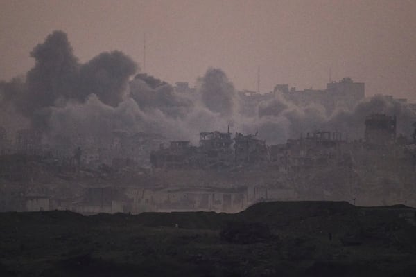 Smoke rises after an explosion during Israeli air and ground operations in the Gaza Strip as seen from southern Israel, Tuesday, July 22, 2025. (AP Photo/Leo Correa)