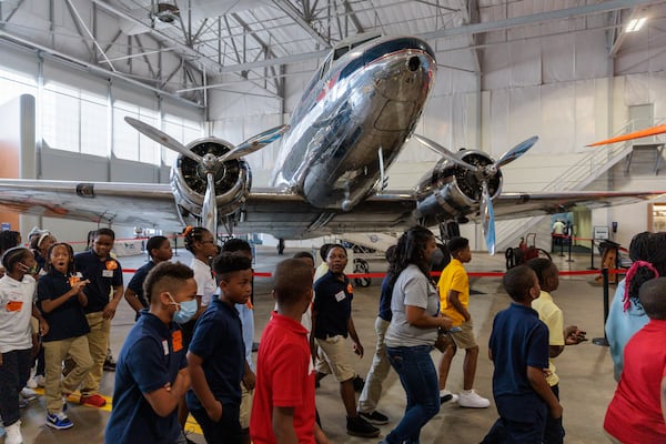 Fifth grade students from West Clayton Elementary School tour the Delta Flight Museum in Atlanta in 2022. Arvin Temkar/AJC