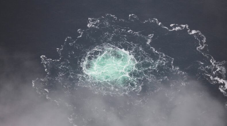 FILE - This photo provided by Swedish Coast Guard shows a leak from Nord Stream 2 on Sept. 28, 2022. (Swedish Coast Guard via AP, File)