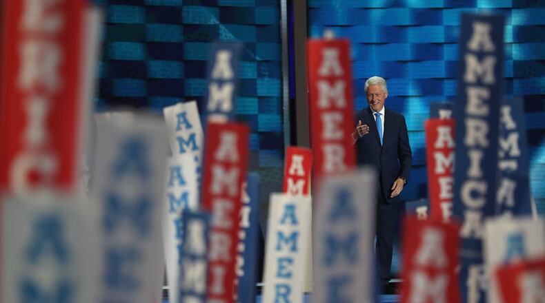 PHILADELPHIA, PA - JULY 26: Former US President Bill Clinton arrives on stage to deliver remarks on the second day of the Democratic National Convention at the Wells Fargo Center, July 26, 2016 in Philadelphia, Pennsylvania. Democratic presidential candidate Hillary Clinton received the number of votes needed to secure the party's nomination. An estimated 50,000 people are expected in Philadelphia, including hundreds of protesters and members of the media. The four-day Democratic National Convention kicked off July 25. (Photo by Joe Raedle/Getty Images)