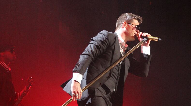 Robin Thicke got close to the crowd from the start of the show.