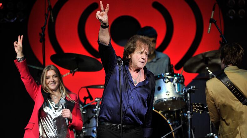 SAN JOSE, CA - JANUARY 28: Musicians Jesse Money (L) and Eddie Money perform on stage during the iHeart80s Party 2017 at SAP Center on January 28, 2017 in San Jose, California. (Photo by Steve Jennings/Getty Images for iHeartMedia)