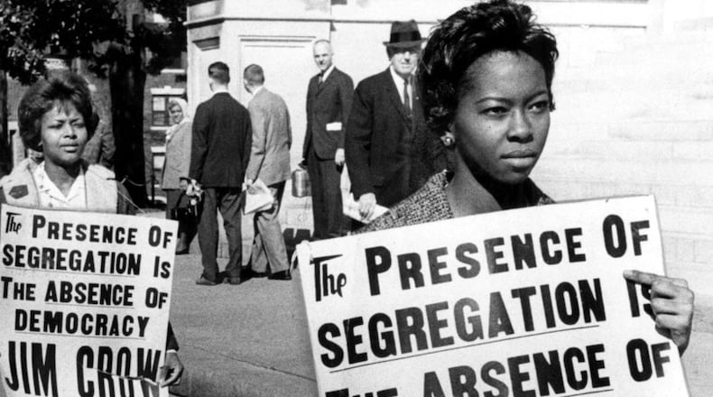 Atlanta University students picket against segregation at the Georgia State Capitol in this February 1962 file photo. (Bill Wilson/The Atlanta Journal-Constitution)