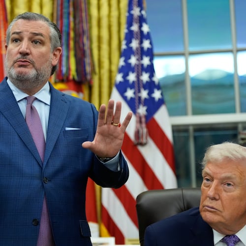 Ted Cruz R-Texas, left, speaks during a signing ceremony regarding AI initiatives with President Donald Trump in the Oval Office of the White House, Thursday, Dec. 11, 2025, in Washington. (AP Photo/Alex Brandon)