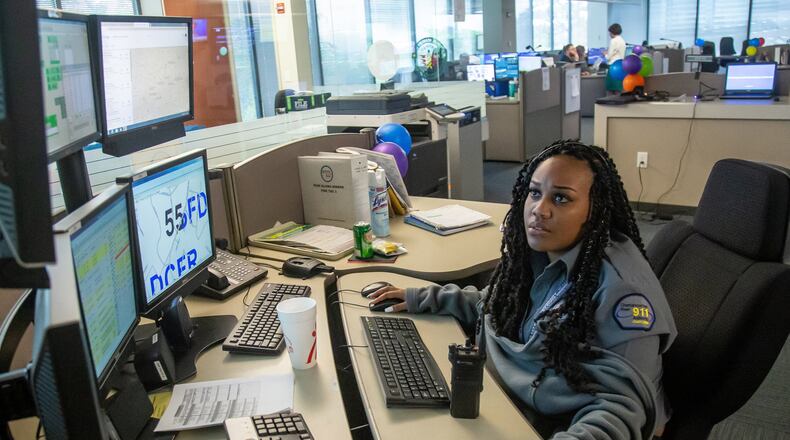 Operator Kelah Handley answers calls at Sandy Springs’ 911 dispatch center Wednesday, April 17, 2019. STEVE SCHAEFER / SPECIAL TO THE AJC