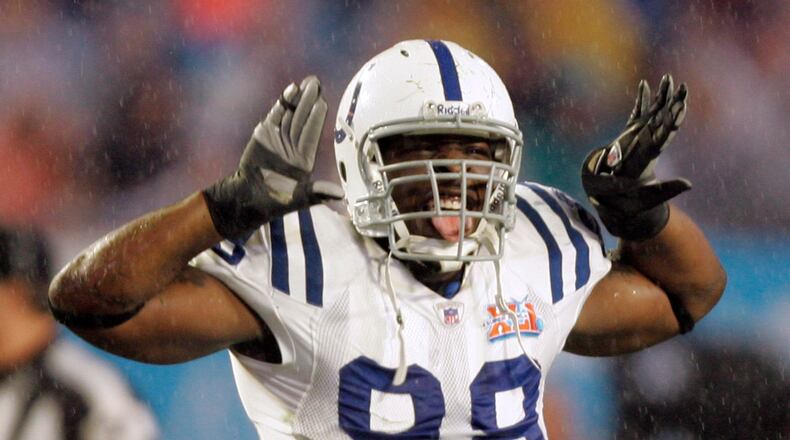 Indianapolis Colts defensive end Robert Mathis (98) reacts after the Colts recovered a fumble against the Chicago Bears in the first quarter of the Super Bowl XLI football game at Dolphin Stadium in Miami on Sunday, Feb. 4, 2007. (AP Photo/David J. Phillip) ORG XMIT: SB186