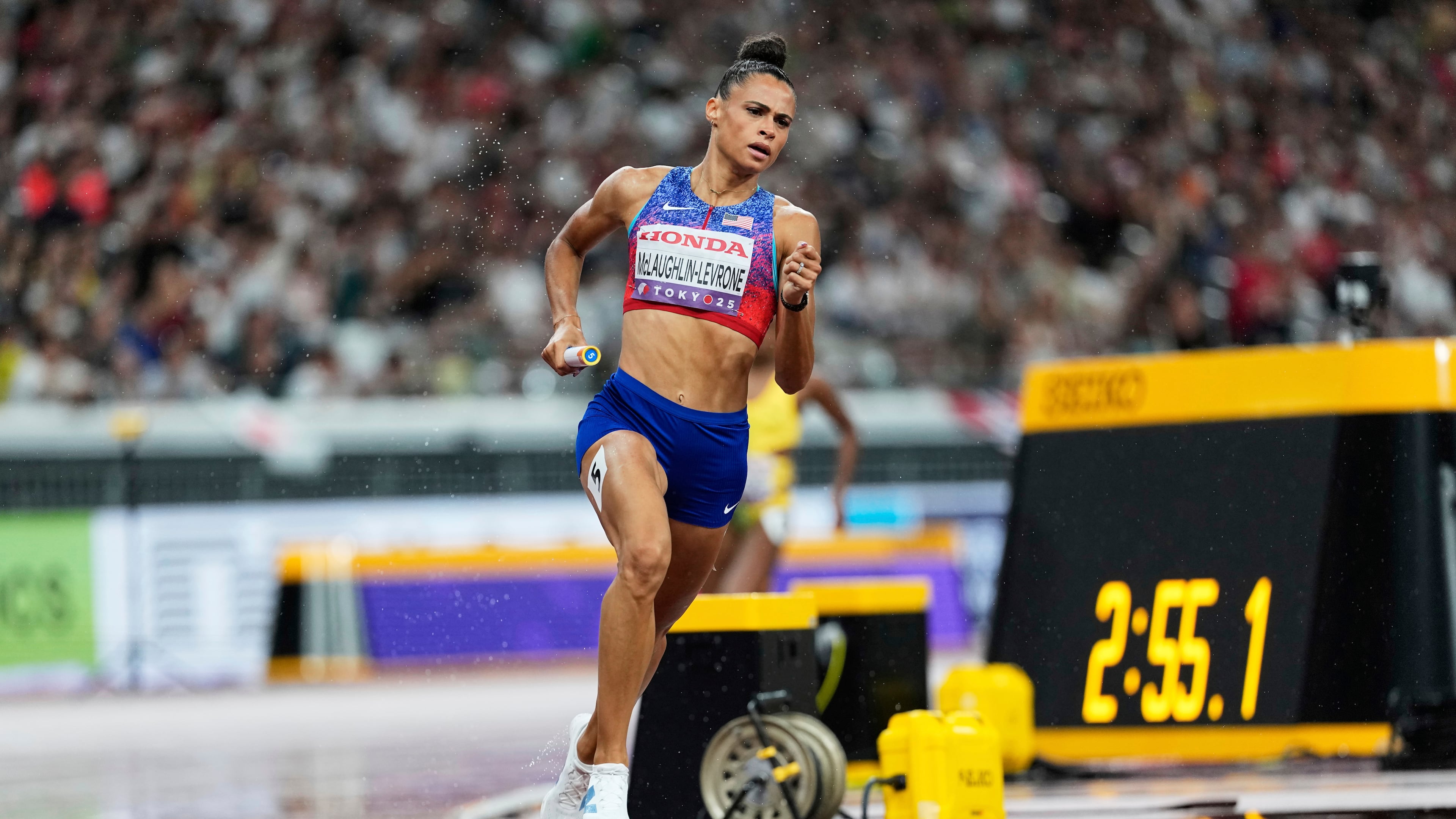 United States' Sydney McLaughlin-Levrone competes in the women's 4 X 400 meters relay at the World Athletics Championships in Tokyo, Sunday, Sept. 21, 2025. (AP Photo/Ashley Landis)
