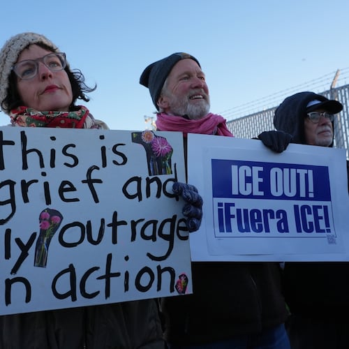 Protesters gather outside an ICE processing facility in Broadview, Ill., a suburb of Chicago, Friday, Oct. 24, 2025. (AP Photo/Nam Y. Huh)