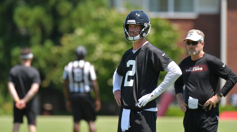 Falcons quarterback Matt Ryan (2) watches during team practice in Flowery Branch on Thursday, May 30, 2019.  HYOSUB SHIN / HSHIN@AJC.COM