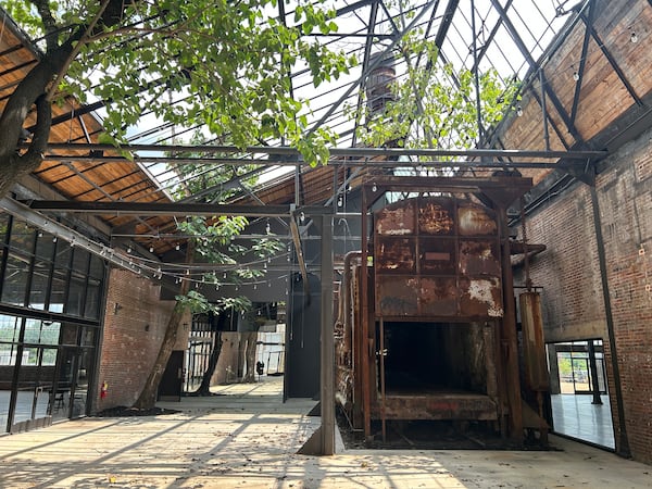 A renovated building at Pullman Yards kept the trees that had taken root while the facility was abandoned. (Thomas Lake/AJC)