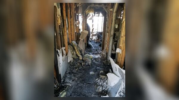 The home of DeKalb County police Officer Marty Williams was engulfed March 1. The police department is holding a fundraiser to help Williams and his family find a new home. (Credit: DeKalb County Police Department)