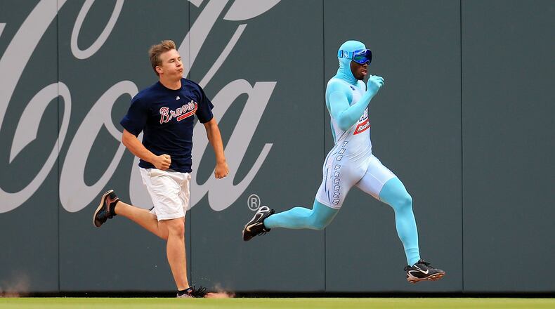 The Freeze races a fan in between innings during a game between the Atlanta Braves and the New York Mets at SunTrust Park on June 10, 2017 in Atlanta.