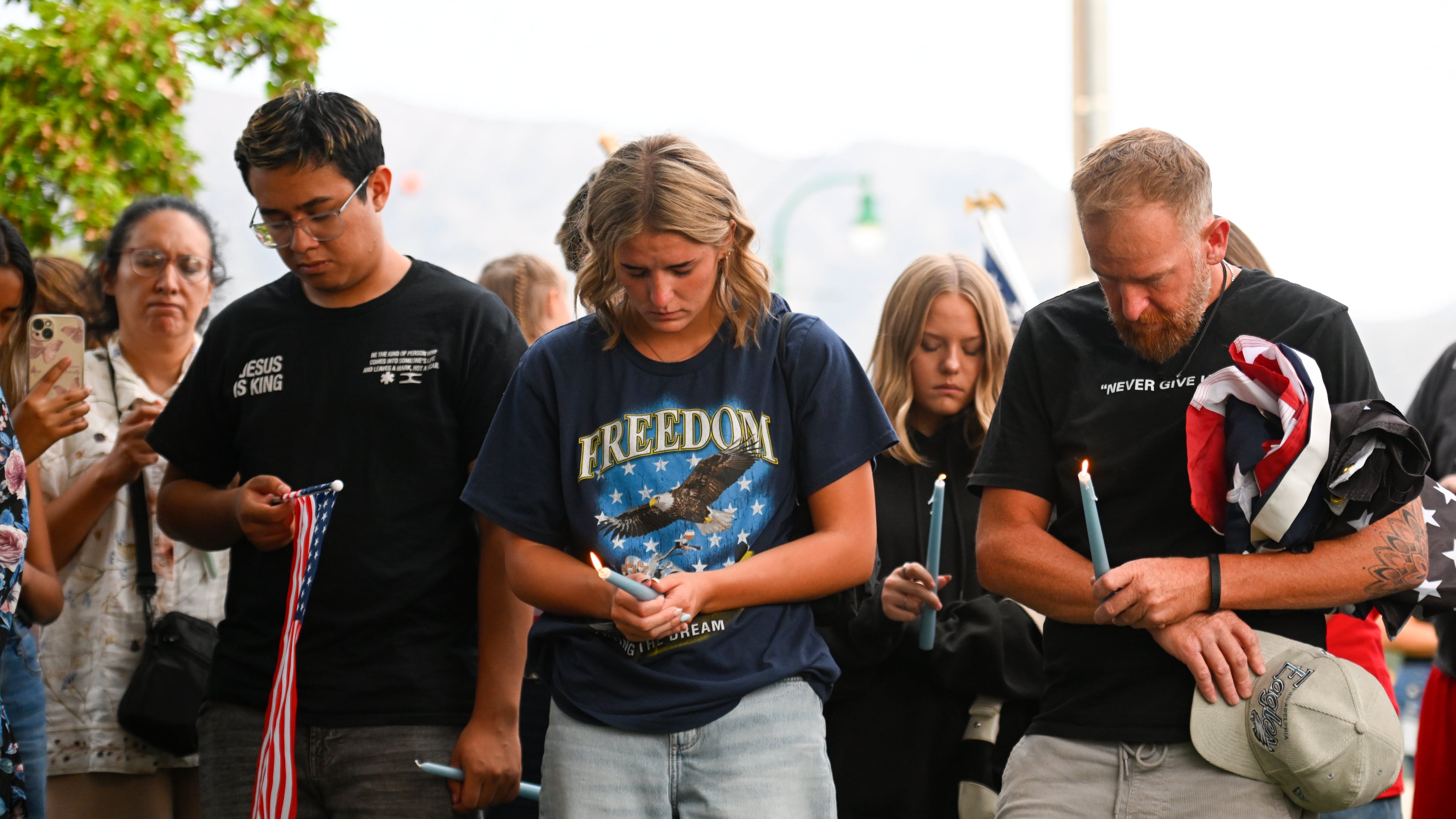 People attend a vigil at Timpanogos Regional Hospital for Charlie Kirk, the CEO and co-founder of Turning Point USA who was shot and killed, on Wednesday, Sept. 10, 2025, in Orem, Utah. (Alex Goodlett/AP)