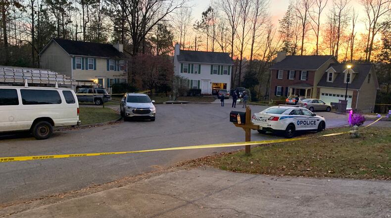 Police are investigating the deaths of three people whose bodies were discovered Saturday afternoon in a Gwinnett County neighborhood.