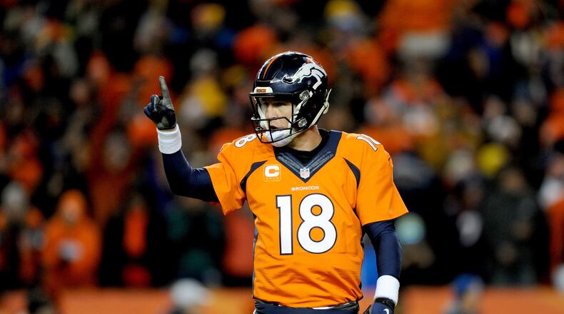 DENVER, CO - JANUARY 17: Peyton Manning #18 of the Denver Broncos signals to the sideline during the AFC Divisional Playoff Game against the Pittsburgh Steelers at Sports Authority Field at Mile High on January 17, 2016 in Denver, Colorado. (Photo by Dustin Bradford/Getty Images)