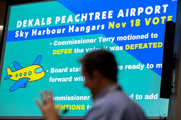 DeKalb Commissioner Ted Terry speaks at the town hall meeting at Brookhaven City Centre in Brookhaven on Tuesday. (Arvin Temkar/AJC)