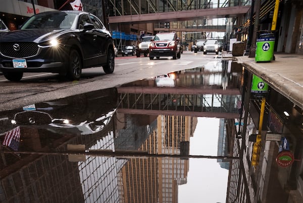 Thunderstorms and rain is expected in the metro area including downtown Minneapolis, Minn., Monday, April 28, 2025. (Richard Tsong-Taatarii/Star Tribune via AP)