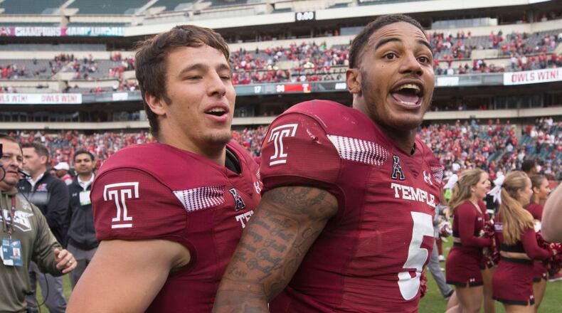 Kevin DeCaesar and Shaun Bradley of the Temple Owls celebrate after the game against the Cincinnati Bearcats at Lincoln Financial Field on October 20, 2018 in Philadelphia, Pennsylvania. The Temple Owls defeated the Cincinnati Bearcats 24-17 in overtime. (Photo by Mitchell Leff/Getty Images)