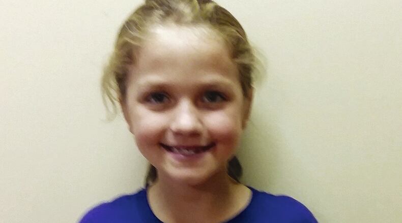 Woodstock Elementary School first-grader Kamryn Brown won the Cherokee County Farm Bureau’s First Grade Apple Coloring Contest. All Cherokee County School District elementary schools participated, with more than 3,000 entries received. Each school’s first- and second-place winners and their families have been invited for a “Day on the Farm” in May at Cagle’s Family Farm. Kamryn also received a $50 Walmart gift card.