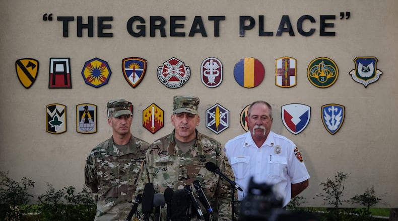 June 3, 2016 - Major general, John Uberti, Fort Hood deputy commander, center, flanked by Col. Todd Fox, left, and Fort Hood fire chief Coleman Smith, right, speaks to the media during a press conference held at the main gate of Fort Hood, Texas, on Friday, June 3, 2016. Fort Hood says that five soldiers were killed, four are still missing and three were rescued after the Army vehicle they were in was swept away in a low water crossing during training held on Thursday. RODOLFO GONZALEZ / AUSTIN AMERICAN-STATESMAN