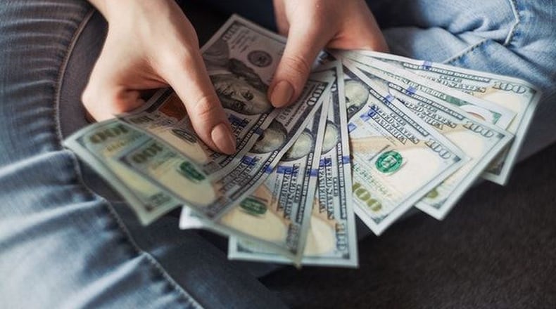 Ten people, including six from Georgia and a former Fulton County deputy, have been indicted in a fraud scheme involving requesting loans for non-existent businesses.