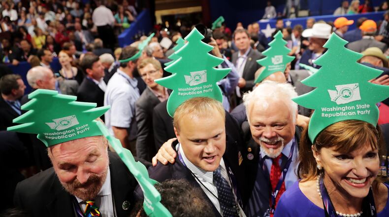 CLEVELAND, OH - JULY 19: Delegates take part in the roll call on the second day of the Republican National Convention on July 19, 2016 at the Quicken Loans Arena in Cleveland, Ohio. Republican presidential candidate Donald Trump received the number of votes needed to secure the party's nomination. An estimated 50,000 people are expected in Cleveland, including hundreds of protesters and members of the media. The four-day Republican National Convention kicked off on July 18. (Photo by Chip Somodevilla/Getty Images)