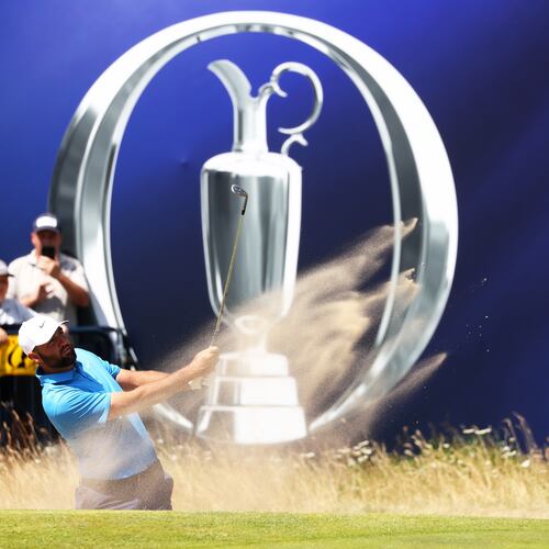 US golfer Scottie Scheffler plays out of the bunker during a practice round at the British Open Golf Championship at Royal Birkdale, Southport, England, Monday, July 13, 2026. (AP Photo/Peter Morrison)
