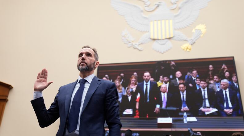 Former Justice Department special counsel Jack Smith takes an oath before the House Judiciary Committee at the Capitol in Washington, Thursday, Jan. 22, 2026. (AP Photo/Mark Schiefelbein)