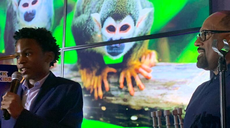 Marlon Somersall, a 15-year-old Atlanta International School student, will be attending the Frank Ski Kids Foundation trip this year to Hawaii to save coral reefs. He spoke at the Frank Ski Wine Auction. RODNEY HO/rho@ajc.com