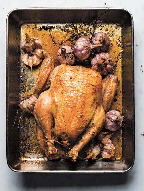 Roast Chicken with Whole Garlic Heads. Excerpted from David Tanis Market Cooking by David Tanis (Artisan Books). Copyright ? 2017. (Evan Sung)