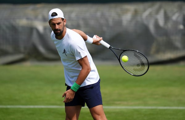 Novak Djokovic during a practice session at the All England Lawn Tennis and Croquet Club in Wimbledon ahead of the Wimbledon Championships, Friday June 27, 2025. (John Walton/PA via AP)
