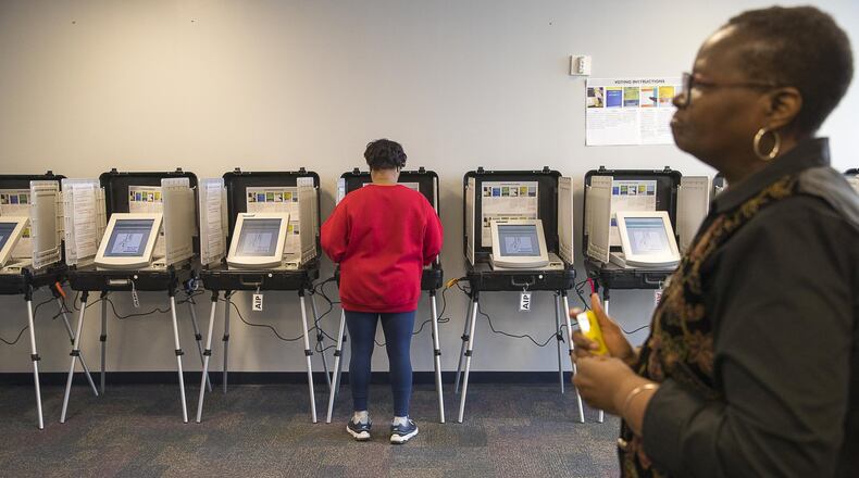 02/25/2019 — Lawrenceville, Georgia — A Gwinnett County resident participates in early voting at the Gwinnett County Board of Voter Registrations and Elections building in Lawrenceville, Monday, February 25, 2019. The special ballot asks whether to expand MARTA into Gwinnett County. (ALYSSA POINTER/ALYSSA.POINTER@AJC.COM)