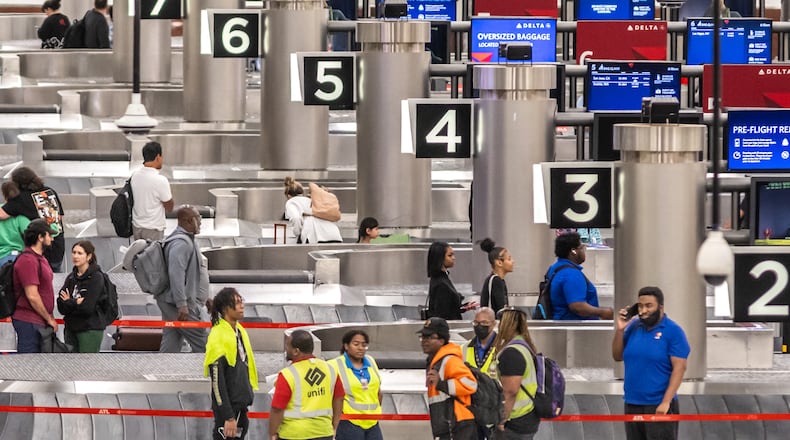 Travelers swelled Atlanta’s Hartsfield-Jackson International Airport on Friday, May 24, 2024. (John Spink/AJC)