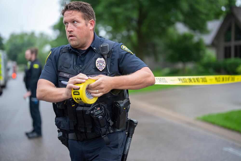 Police say they have recovered writings in a car used by suspect in shooting  of Minnesota lawmakers