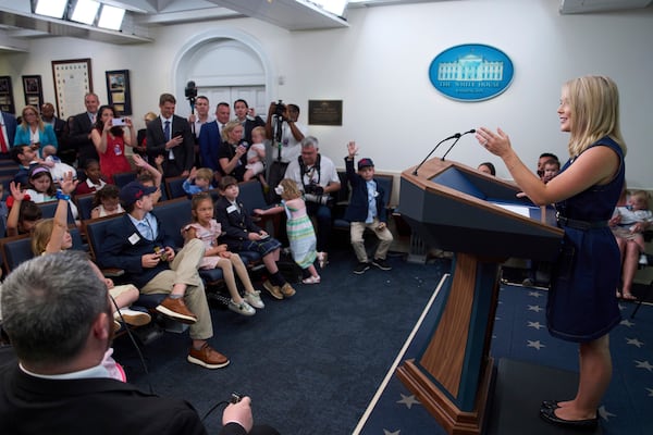 White House press secretary Karoline Leavitt speaks with children during a briefing for children during a Take Our Daughters and Sons to Work Day in the James Brady Press Briefing Room at the White House, Tuesday, May 20, 2025, in Washington. (AP Photo/Evan Vucci)