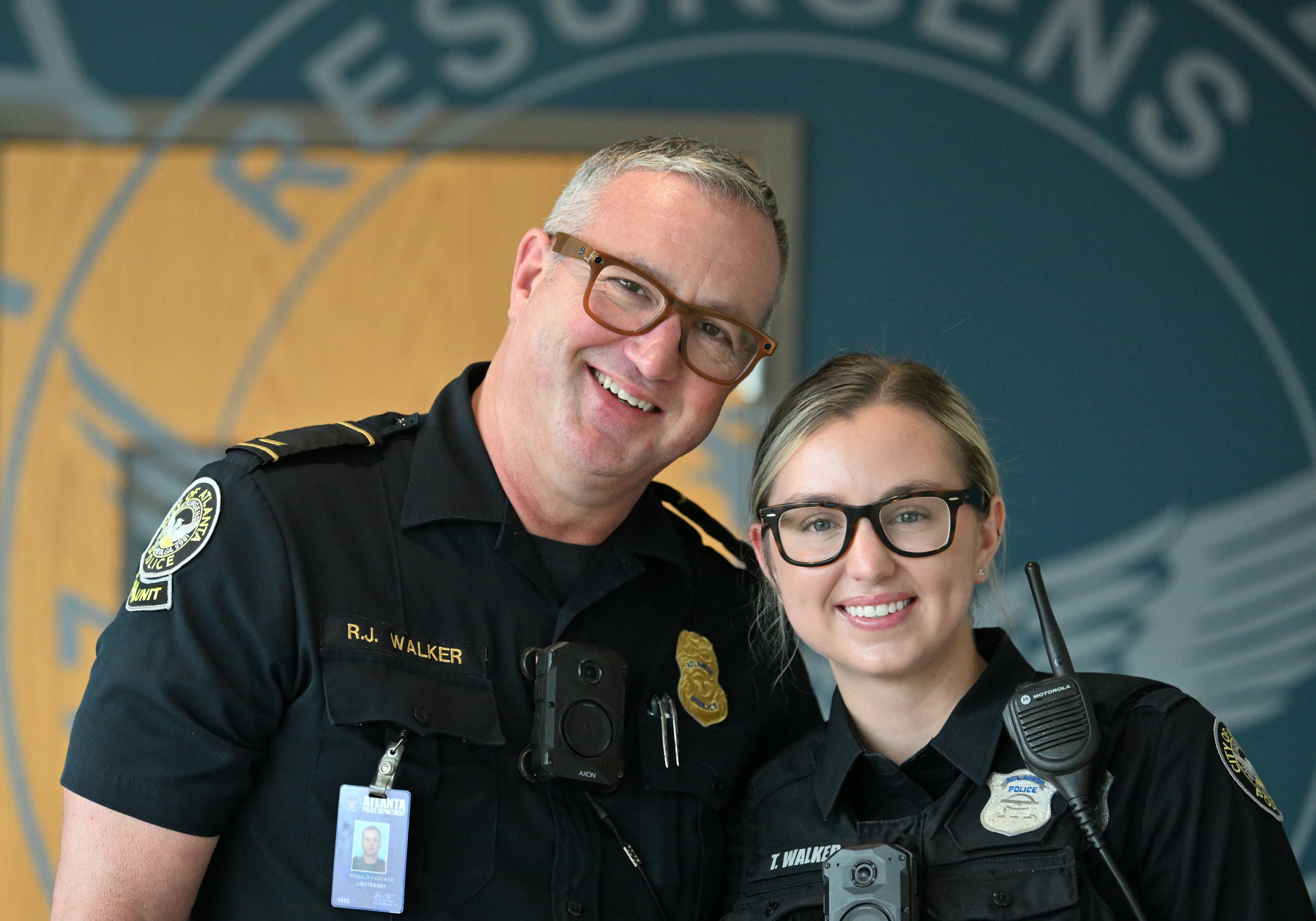 Lt. Ronald J. Walker and Taylor Walker have a strong bond. (Hyosub Shin/AJC)