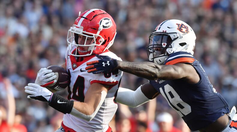 October 9, 2021 Auburn, Alabama - Georgia wide receiver Ladd McConkey (84) makes a move after catching a touchdown pass during the second half of an NCAA college football game at Jordan–Hare Stadium in Auburn, Alabama on Saturday, October 9, 2021. Georgia won 34-10 over Auburn. (Hyosub Shin / Hyosub.Shin@ajc.com)