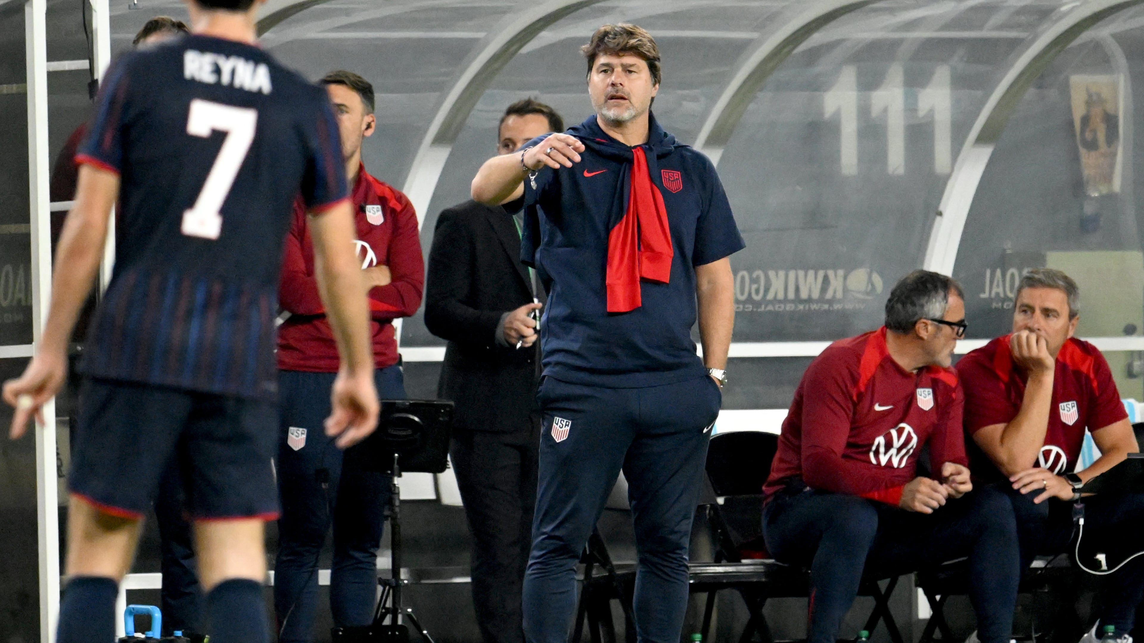United States head coach Mauricio Pochettino (center) speaks to Gil Reyna during the second half of an international friendly soccer game against Uruguay on Tuesday, Nov. 18, 2025, in Tampa, Fla. (Jason Behnken/AP)