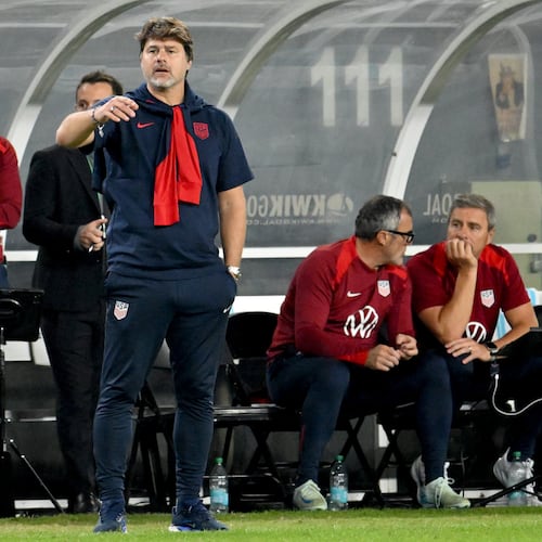 United States head coach Mauricio Pochettino (center) speaks to Gil Reyna during the second half of an international friendly soccer game against Uruguay on Tuesday, Nov. 18, 2025, in Tampa, Fla. (Jason Behnken/AP)