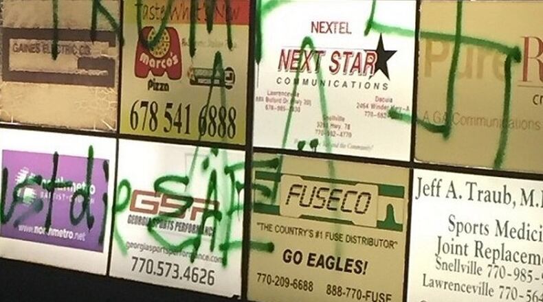 Graffiti that included the word "Trump" and a swastika, as well as slurs directed toward gays, blacks and Hispanics, was found Nov. 11, 2016 at Gwinnett's Collins Hill High School.