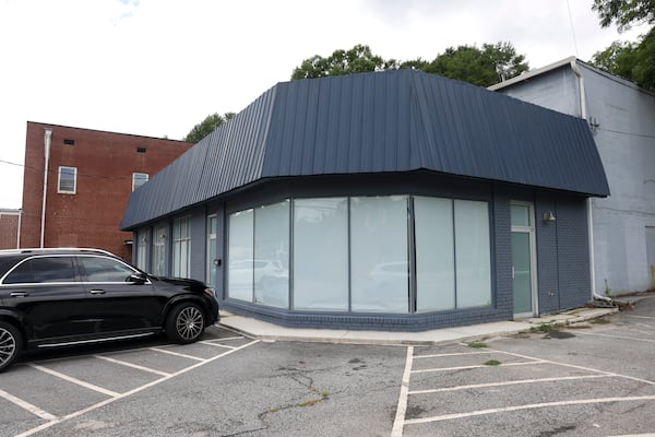 The exterior of Vesper Theatre on Church Street in the sleepy but growing East Point downtown. (Jason Getz/AJC)