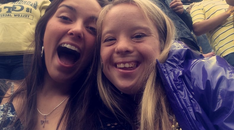 Alex Goodman (right), with her student mentor Catherine Johnson at Georgia Tech, where she is enrolled in the Expanding Career, Education and Leadership Opportunities program for students with mild intellectual and developmental disabilities. Alex, 22, has Down syndrome. CONTRIBUTED