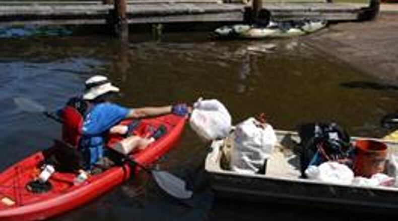 Fayette County is seeking volunteers with canoes and kayaks to help cleanup Peachtree City’s Lake McIntosh.