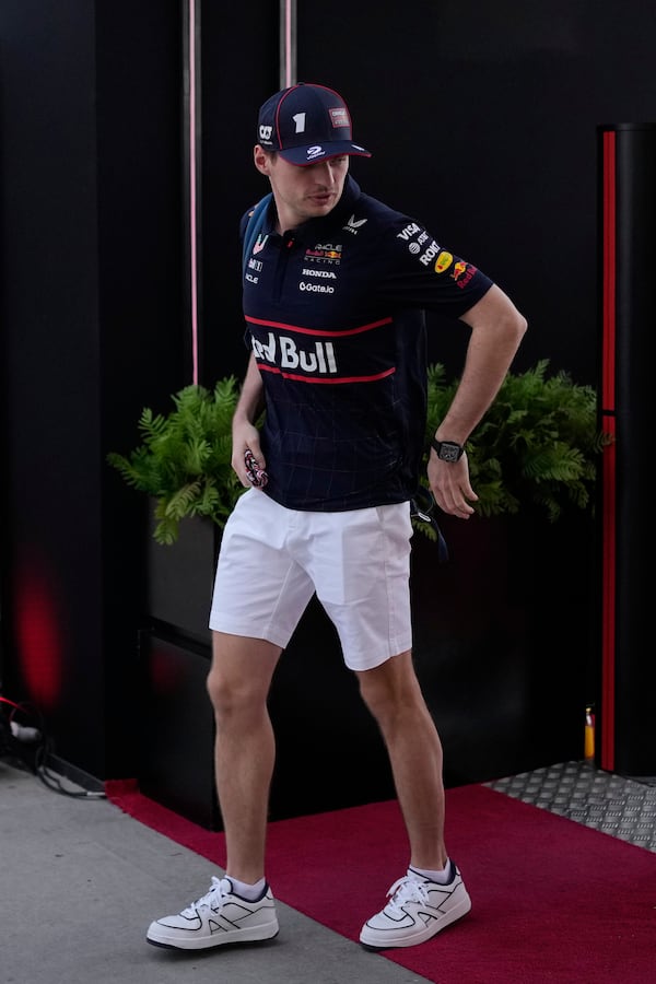 Red Bull driver Max Verstappen of the Netherlands arrives to the track for the Formula One Bahrain Grand Prix at the Bahrain International Circuit in Sakhir, Bahrain, Sunday, April 13, 2025. (AP Photo/Altaf Qadri)