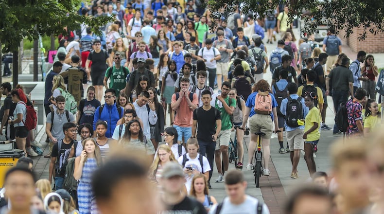 Months before the COVID-19 pandemic hit, students filled the Georgia Tech Walkway on Monday, Aug. 19, 2019, as it began its first day of classes. Georgia Tech has attempted to increase its online education offerings in recent years. University System of Georgia officials on Tuesday discussed a plan to offer more courses online to adult learners. AJC FILE PHOTO