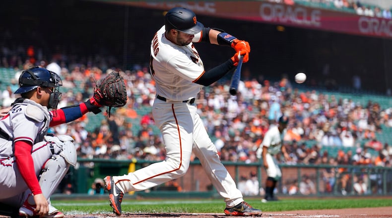San Francisco Giants' Austin Wynns hits an RBI single against the Atlanta Braves during the second inning of a baseball game in San Francisco, Wednesday, Sept. 14, 2022. (Godofredo A. Vásquez/AP)