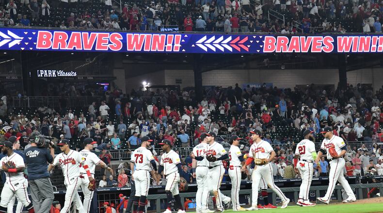 Braves players celebrate their win over the Phillies at Truist Park, Tuesday, September 19, 2023, in Atlanta. (Hyosub Shin / Hyosub.Shin@ajc.com)