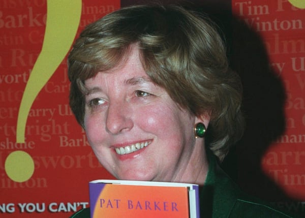 FILE - English novelist Pat Barker holds her latest book, "The Ghost Road", in London Tuesday night Nov. 7 1995 just after the announcement that it had won her the 1995 Booker Prize. (AP Photo/Max Nash, file)