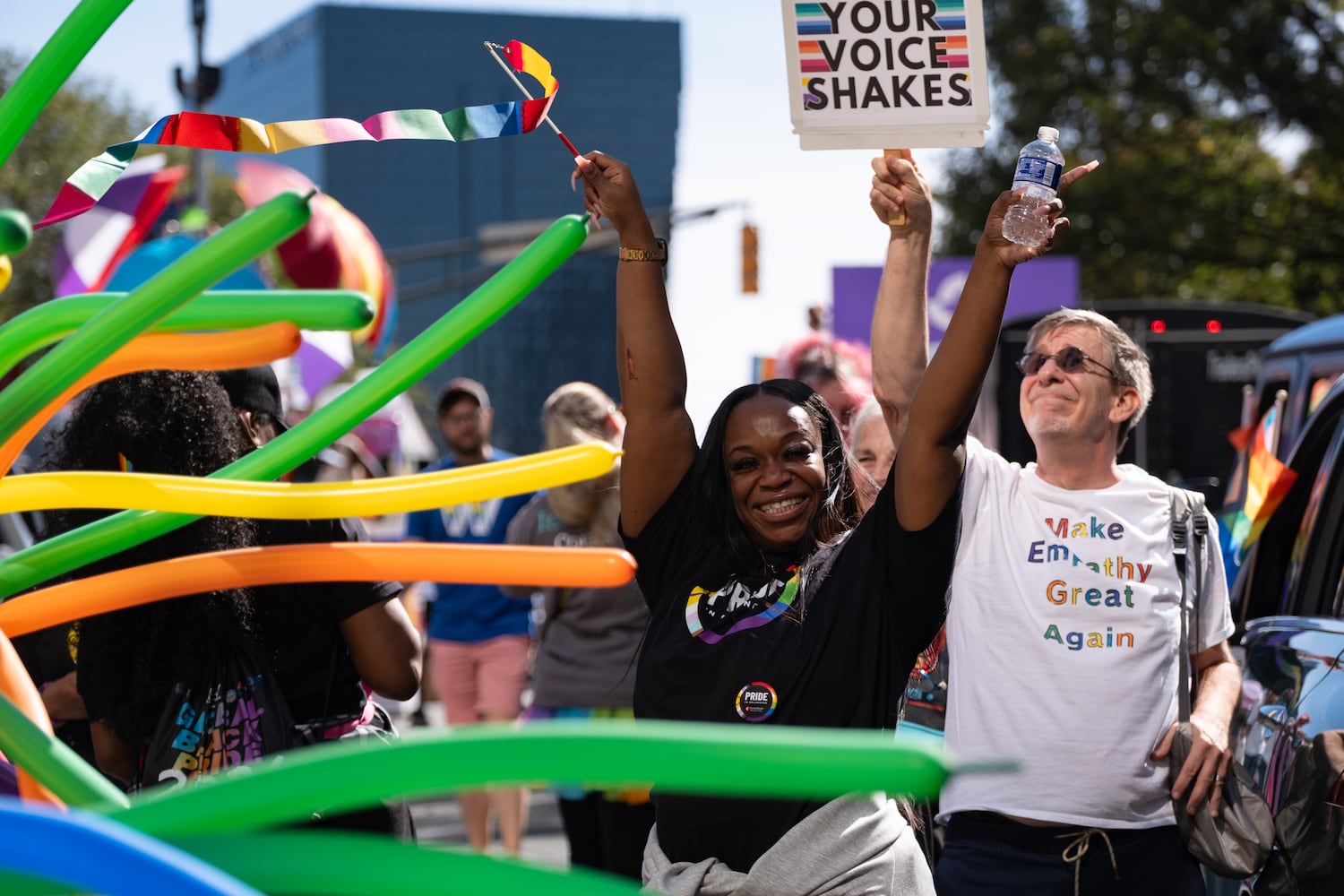 People get in the mood before the start of the Atlanta Pride Parade on Sunday, Oct. 12, 2025. (Ben Gray for the AJC)